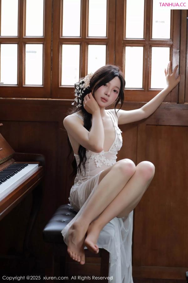   [XiuRen]高清写真图 2025.04.25 No.10198 橙子酱Lillian 白色蕾丝第53张图片